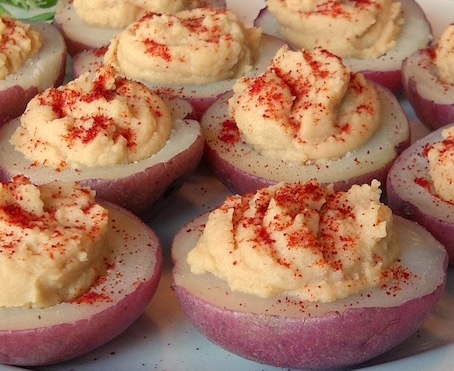 photograph of red potatoes with hummus vegan deviled eggs